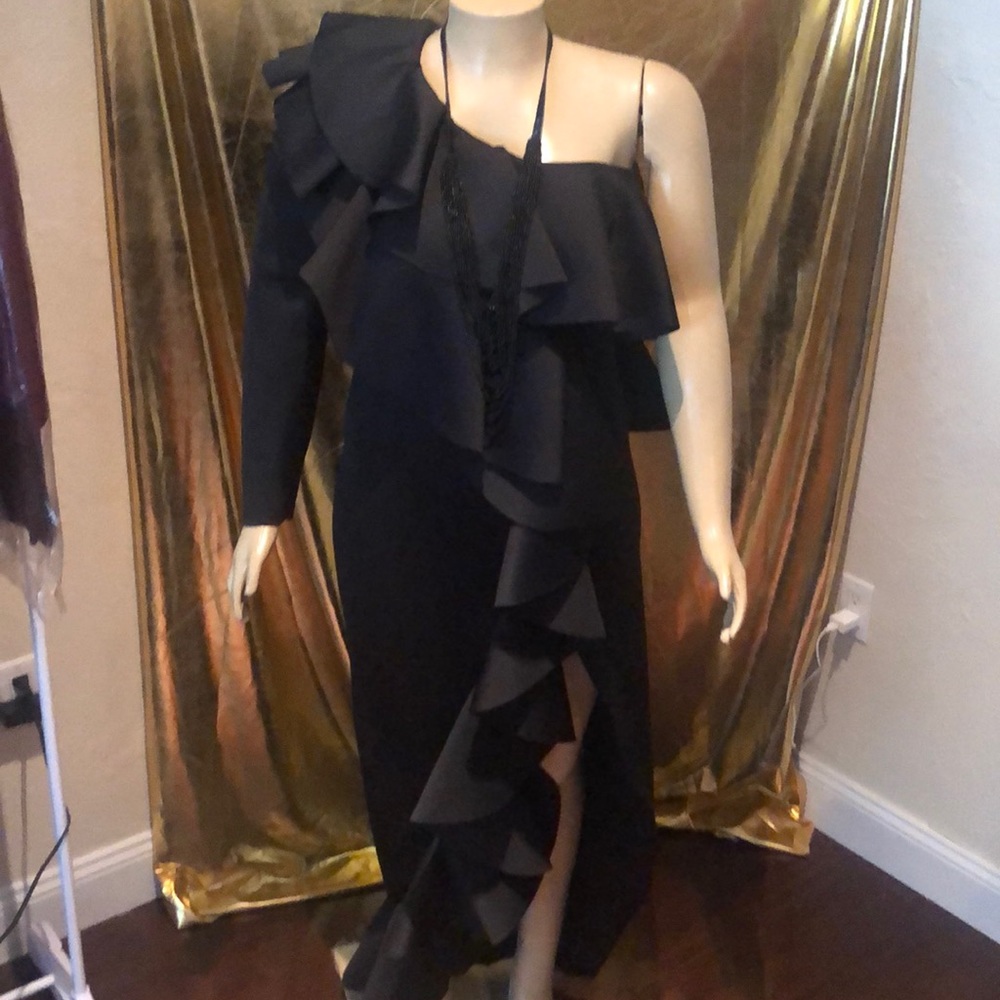 Brings the funeral to a slay dress